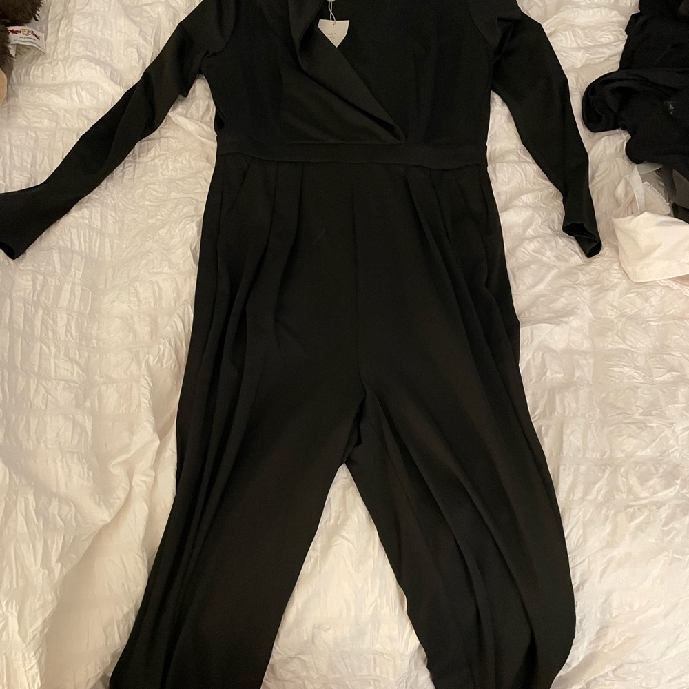 Black never worn jumpsuit size 4